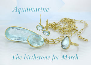A teardrop, faceted aquamarine pendant by designer Maria Beaulieu, featured on her handcrafted lightweight link chain, a pair of aquamarine earrings by Rosanne Pugliese and a faceted aquamarine ring by Gabriella Kiss