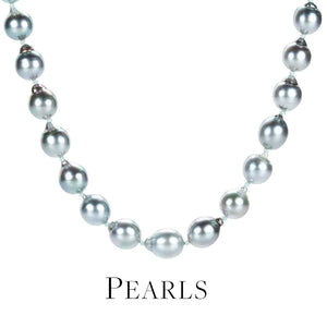 A metallic gray baroque freshwater pearl strand by jewelry designer Maria Beaulieu. Link to the pearl necklace collection