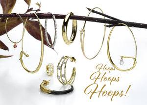 18k yellow gold hoop earrings in various different sizes by jewelry designers Margaret Solow, Gabriella Kiss, Sethi Couture, Paul Morelli, Nicole Landaw and Todd Pownell 