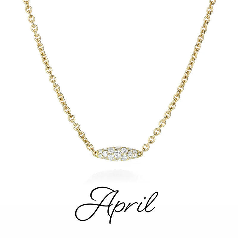 An 18k yellow gold and diamond pipette necklace by jewelry designer Paul Morelli. 
