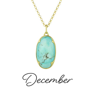 An 18k yellow gold chain with a bezel set, oval, light blue turquoise pendant. Handcrafted by jewelry designer Gabriella Kiss.