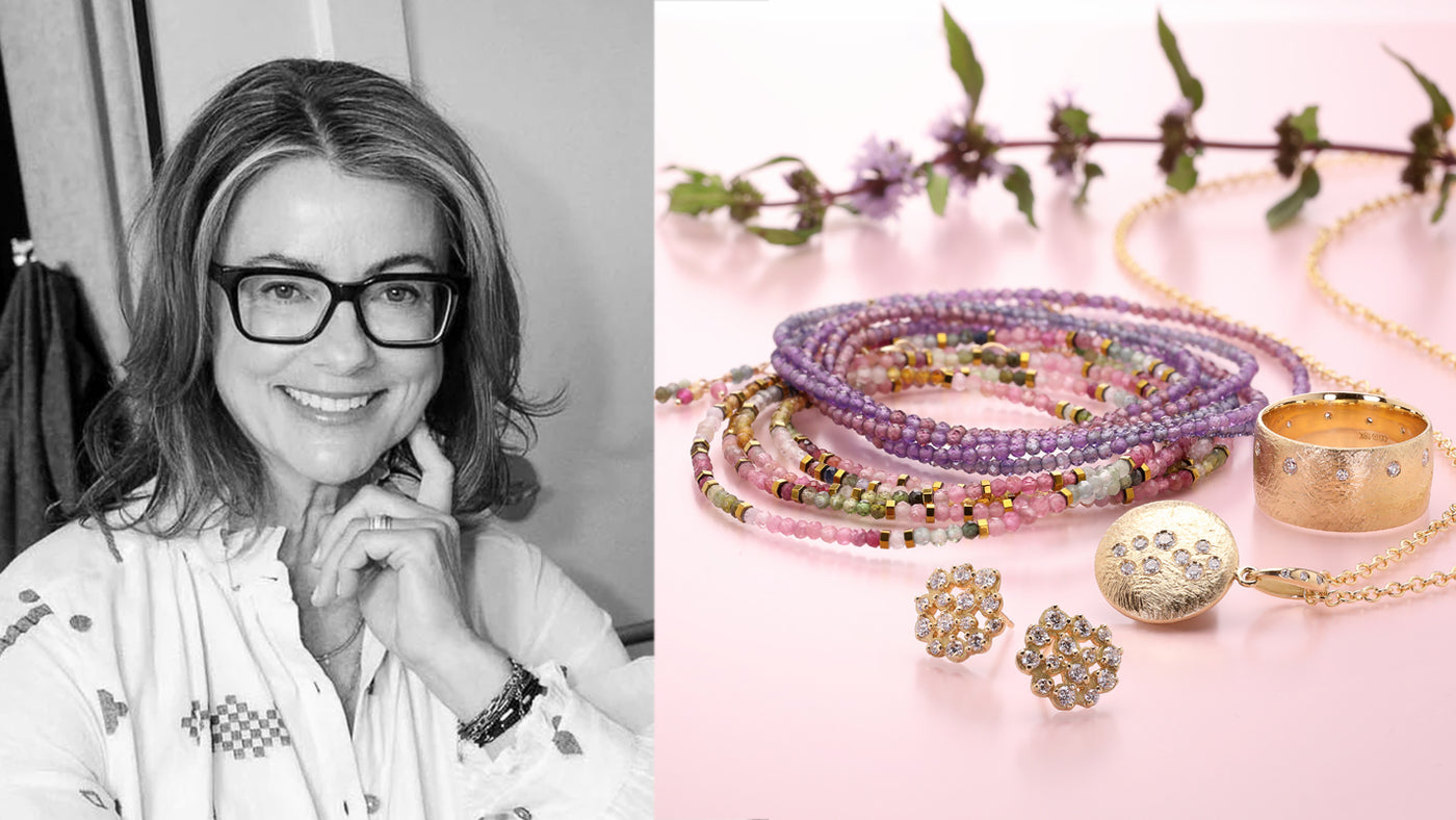 Person wearing glasses and a white shirt next to jewelry including bracelets and earrings on a pink surface.
