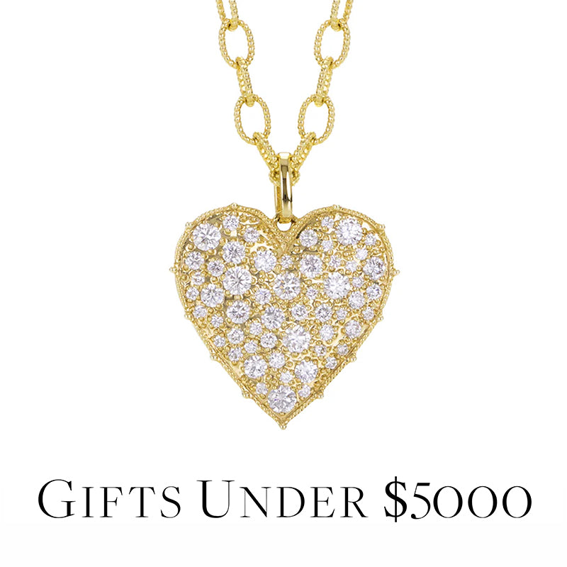 Gold heart-shaped necklace with diamonds on a white background, labeled 'Gifts Under $5000'.