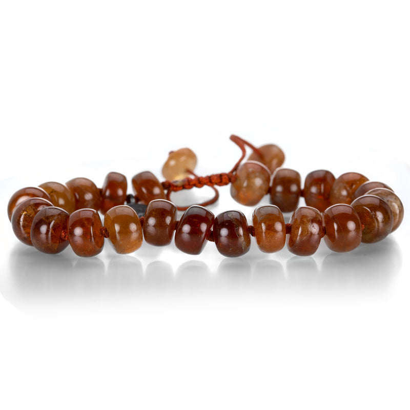 Joseph Brooks 10mm Smooth Orange Garnet Bracelet | Quadrum Gallery