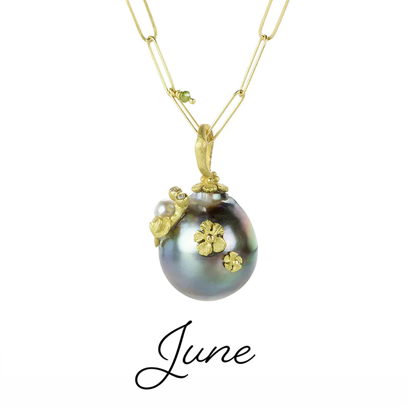Pearl necklace with gold accents on a white background, featuring the word 'June'.