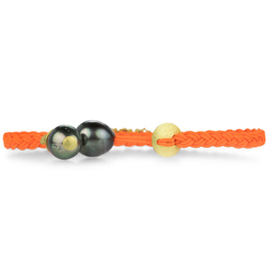 Lene Vibe Orange Cord Braided Floral Bracelet | Quadrum Gallery