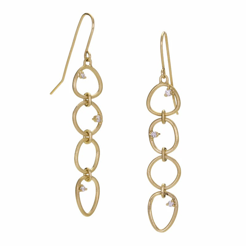 Gold chain earrings with small diamonds on a white background