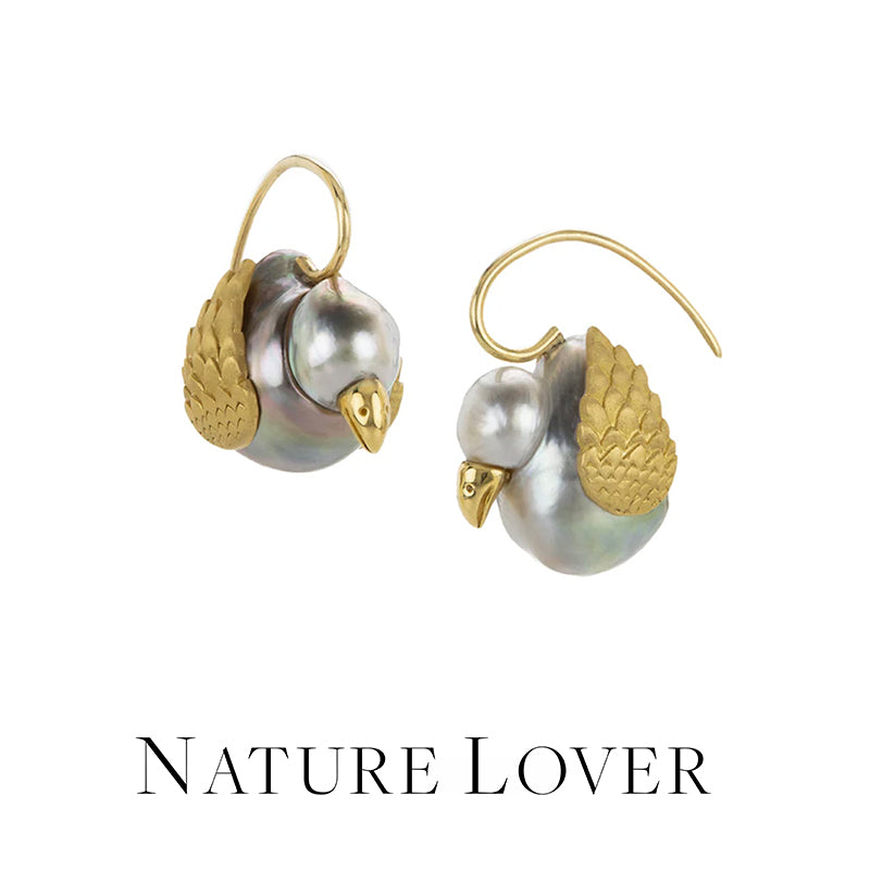 Pair of earrings with gold and pearl design on a white background, labeled 'Nature Lover'.
