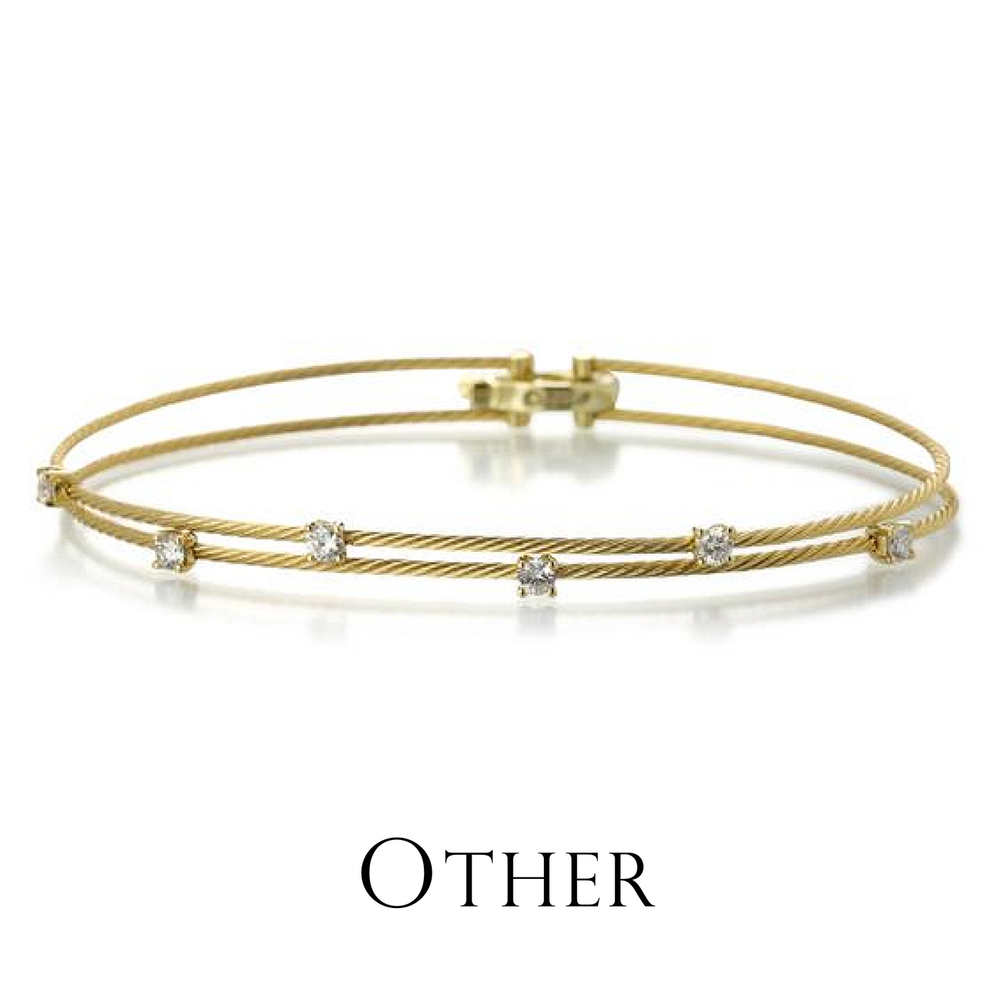 An 18k yellow gold, double wire bracelet with 6 white diamonds by the jewelry designer Paul Morelli. Link to the "other" bracelet collection