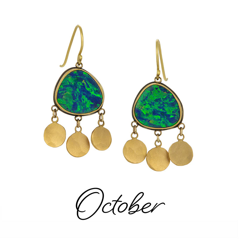 Gold earrings with green gemstones and gold discs on a white background, labeled 'October'.