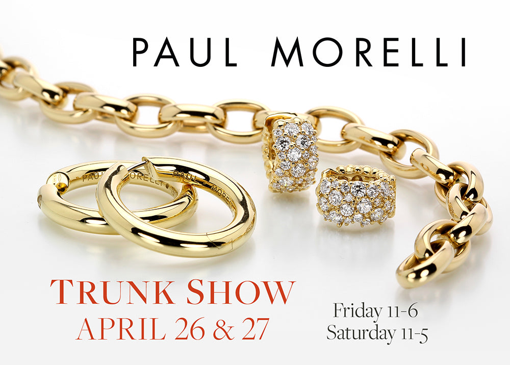 A pair of 18k yellow gold, ultimate hoop earrings, a pair of 18k yellow gold diamond confetti earrings and a solid, heavy gold link bracelet by jewelry designer Paul Morelli 