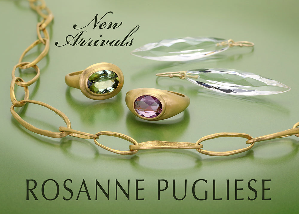Jewelry set including a bracelet, ring with green gemstone, and ring with pink gemstone on a green background. Brand 'Rosanne Pugliese' is visible.