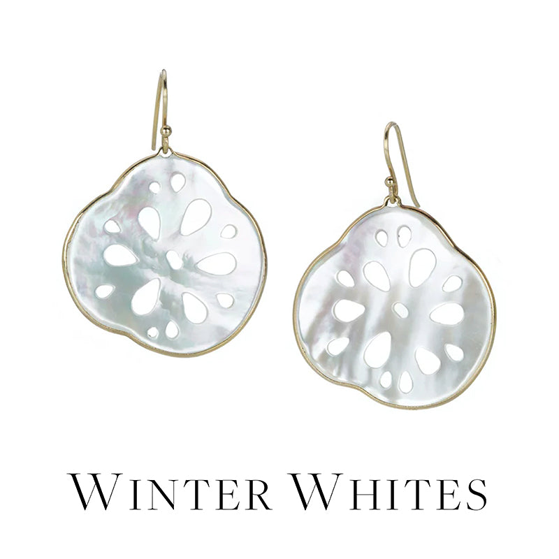 Pair of earrings with a 'Winter Whites' label on a white background