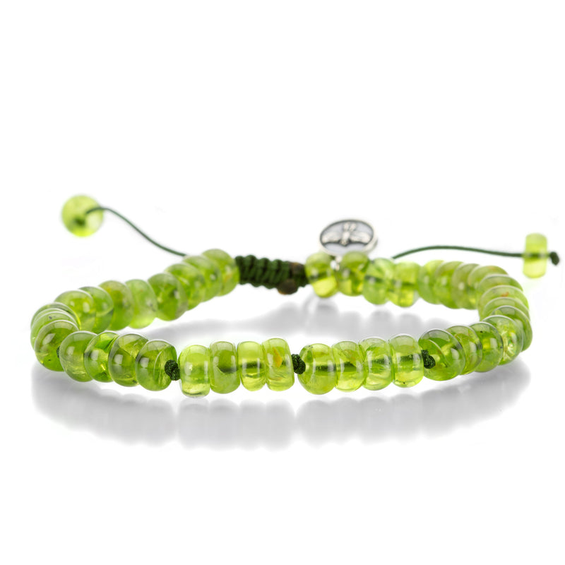 Joseph Brooks 8mm Smooth Peridot Bead Bracelet | Quadrum Gallery